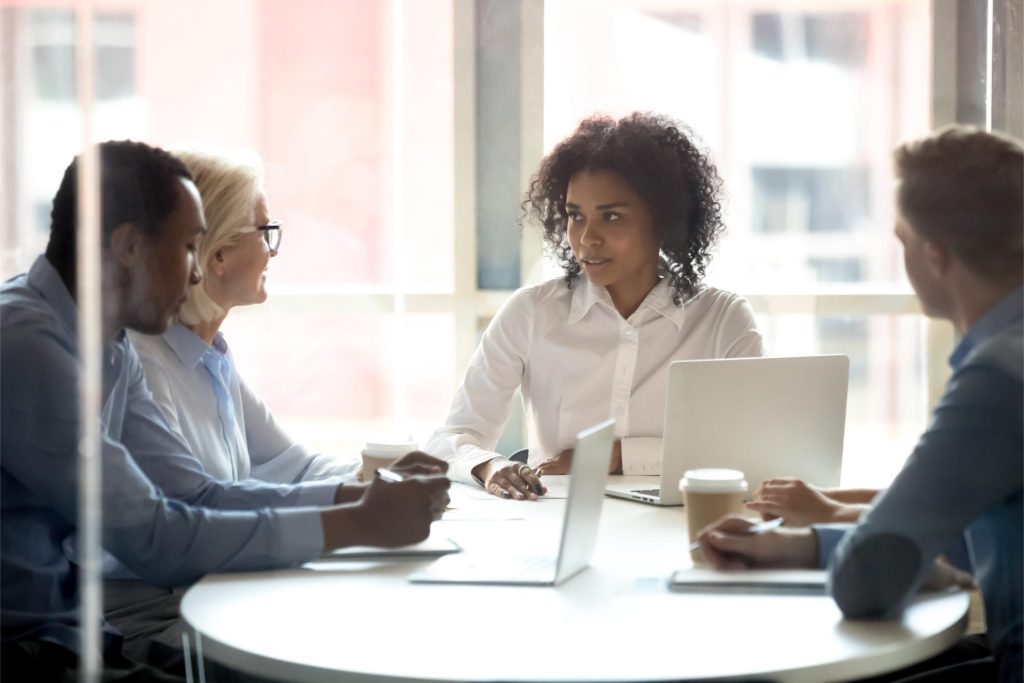 Group of professionals meeting together